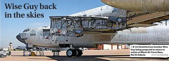  ?? US Air Force/Kelly White ?? > B-52 Stratofort­ress bomber Wise Guy being prepared to return to action at Minot Air Force Base, North Dakota
