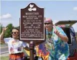  ??  ?? Maria Alger of Brazil and Bob Alger of the US arrive at the Bethel Woods Center for the Arts, the original site of the Woodstock Festival on its 50th anniversar­y in Woodstock, New York. — AFP