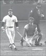  ??  ?? REGGIE JACKSON, a.k.a. Mr. October, watches his third Game 6 home run against the Dodgers leave Yankee Stadium during the 1977 World Series.