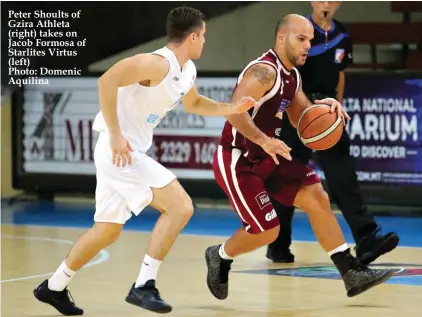  ?? Photo: Domenic Aquilina ?? Peter Shoults of Gzira Athleta (right) takes on Jacob Formosa of Starlites Virtus (left)