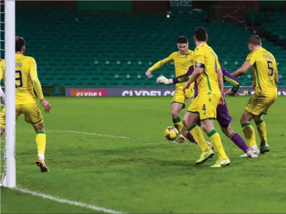  ??  ?? Kevin Nisbet thumps in the equaliser for Hibs after David Turnbull’s free- kick ( left) put Celtic in front at Parkhead