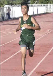  ?? PHOTO AARON BODUS ?? Holtville’s Alan Jimenez in the last leg of his race during Saturday’s IVL meet at Southwest High. Jimenez’s finish of 16:03.71 was the fastest of the day.