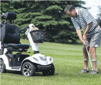  ?? ED KAISER ?? Allen Henschel, diagnosed in 1997 with multiple sclerosis, is still able to play golf with the aid of a scooter which he uses to get around the course. He shot a 76 last year and potted a hole-in-one recently.