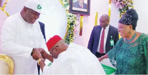  ?? ?? Governor Ifeanyi Ugwuanyi of Enugu State ( left) with the newly elected National President of Nigerian Union of Pensioners ( NUP), Comrade Godwin Abumisi and his wife, Roseline, when the governor hosted Abumisi at the Government House Enugu… yesterday.