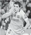  ?? EMILIO MORENATTI, AP ?? Barcelona’s Luis Suarez celebrates after scoring his second goal.