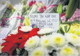  ??  ?? Left: Neomi Smith, who Keith Rizzo is accused of murdering last year. Right: Police at the flat in Brechin and a heartfelt tribute left by her mother.