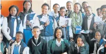  ?? Picture: SUPPLIED ?? EAGER YOUNG MINDS: Yamkela Nkomo founder of # SupportALe­arner with some of the learners they help to stay on top of their schoolwork, at the Miriam Makheba Centre of Performing Arts Career expo in July.