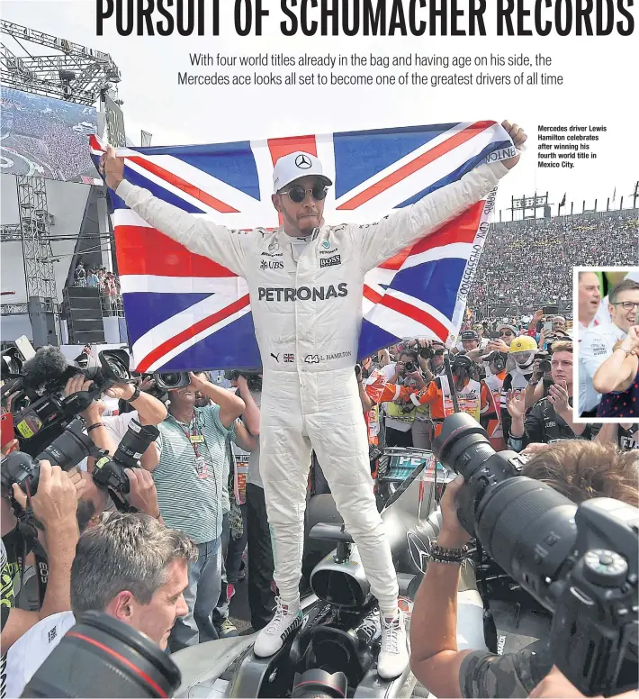  ??  ?? Mercedes driver Lewis Hamilton celebrates after winning his fourth world title in Mexico City.