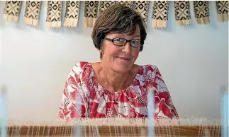  ?? PHOTOS: SUPPLIED/RUSSELL KLEYN ?? Wellington weaver Christine Brimer at her loom. She wove the wool blanket Prime Minister Jacinda Ardern gifted to the new royal baby.