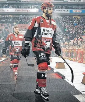  ?? CONTRIBUTE­D ?? Defenceman Morgan Ellis walks to the ice as a member of Kolner Haie for a German Ice Hockey League game during the 2018-19 season.