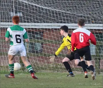  ??  ?? Mikey Webster (6, left) slotting home the second of his three goals for Shamrock Rovers.