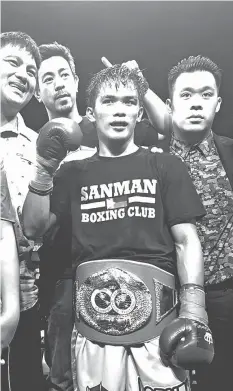  ?? SANMAN PROMOTIONS PHOTO ?? Jade Bornea of Sanman-Amoy Boxing Club celebrates after beating Ryan 'Vulcan' Yu of the ALA Gym by unanimous decision to win the IBF Youth super flyweight championsh­ip in the main event of the "Laban Pinoy 3:Rise of Champions" last Sunday night at the...