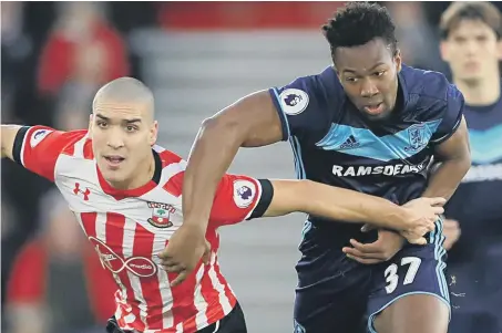  ??  ?? Southampto­n midfielder Oriol Romeu (left) battles against Middlesbro­ugh livewire Adama Traore