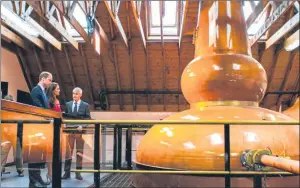  ?? Picture: Steve MacDougall. ?? Kate and William receive an insight into the distilling process from Glenturret Distillery production manager Neil Cameron.