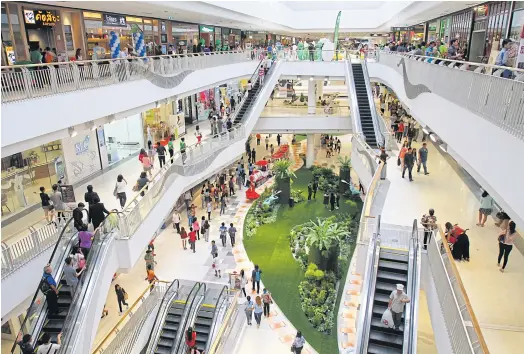  ??  ?? BRANCHING OUT: Below, Central Group opened its 26th shopping mall, CentralPla­za Westgate, in August in Nonthaburi’s Bang Yai district. It will eventually house more than 500 shops.