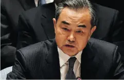  ?? NICHOLAS KAMM / AFP / GETTY IMAGES ?? Chinese foreign minister Wang Yi.