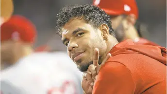  ?? MARY ALTAFFER/AP ?? Seldom-used Nick Williams gestures from the dugout before the Phillies-Mets game Sept. 6.