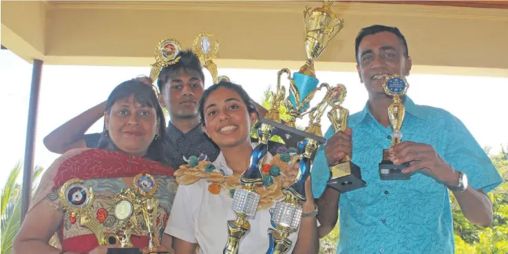  ?? Photo: Simione Haravanua ?? Jai Narayan Dux recipient Raksha Chaudhary (third from left), flanked by (from left), her mother Jyoti Chaudhary, brother Rajneel Chaudhary and father Ronald Chaudhary at their home in Laucala Bay on November 22, 2018.