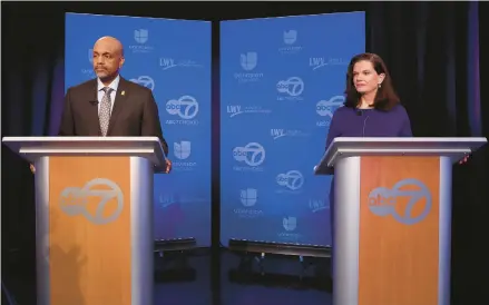  ?? CHRIS SWEDA/CHICAGO TRIBUNE ?? Democratic candidates for Cook County state’s attorney Clayton Harris and Eileen O’Neill Burke prepare to face off in their first debate for at WLS-Ch. 7 studios in Chicago on Thursday.