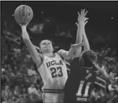  ?? Associated Press ?? UCLA forward Gabriela Jaquez (23) shoots against Washington on Jan. 26. Jaquez scored 21 points with a career-high 15 rebounds to lead UCLA to a 66-58 win over Arizona on Friday.