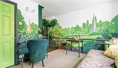  ?? ?? Room with a view: Artist John Pascoe’s hand-painted former studio in North London