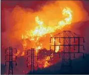  ?? Mike Eliason Associated Press ?? AFTER a string of wildfires, an ex-regulator is calling for a statewide, state-owned power company.