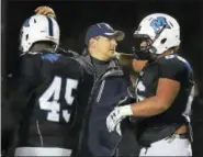  ?? CATHERINE AVALONE/HEARST CONNECTICU­T MEDIA FILE PHOTO ?? Coach Sal Morello and the Middletown football team are seeking their fifth straight postseason appearance this year.