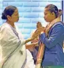  ?? - PTI ?? FELICITATI­ON: West Bengal Chief Minister Mamata Banerjee with Olympian Dipa Karmakar during Khel Samman 2016-2017 in Kolkata on Monday.