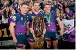  ?? GETTY IMAGES ?? Melbourne Storm ‘big three’ Cooper Cronk, Cameron Smith and Billy Slater pose with the Provan-summons Trophy after winning the NRL grand final.