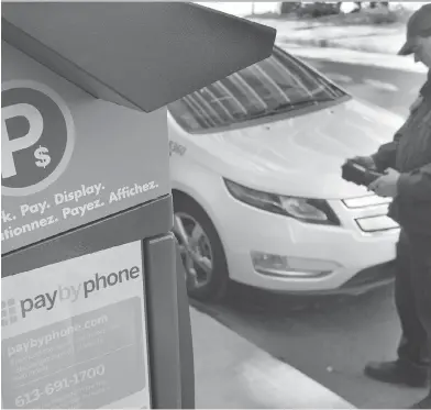  ?? CHRIS MIKULA / POSTMEDIA NEWS ?? The PayByPhone system allows users to securely pay for certain parking spaces and be alerted when time expires.