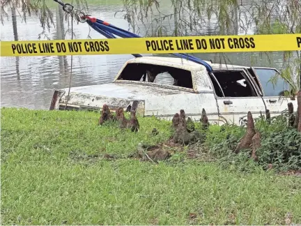  ?? PROVIDED BY SUNSHINE STATE SONAR ?? An Oldsmobile holding human remains is pulled from a pond in Sunrise, Fla. The state has an estimated 76,000 stormwater ponds on top of its 7,500 lakes and 12,000 miles of waterways.