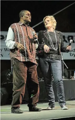  ??  ?? Steve Kekana on stage with PJ Powers, the former lead singer of South African rock band Hotline.