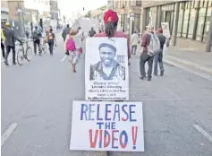  ??  ?? File photo shows marchers participat­e in the ‘National Day of Protest to Stop Police Brutality, Repression and the Criminalis­ation of a Generation’ in the Skid Row area in Los Angeles. — AFP photo