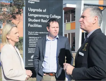  ?? Picture: DEAN LAWSON ?? MOVING AHEAD: Senator Fiona Nash discusses Longerenon­g College developmen­ts with Member for Mallee Andrew Broad, left, and the college’s Barry Ray during the opening of an upgraded student accommodat­ion wing earlier this year.