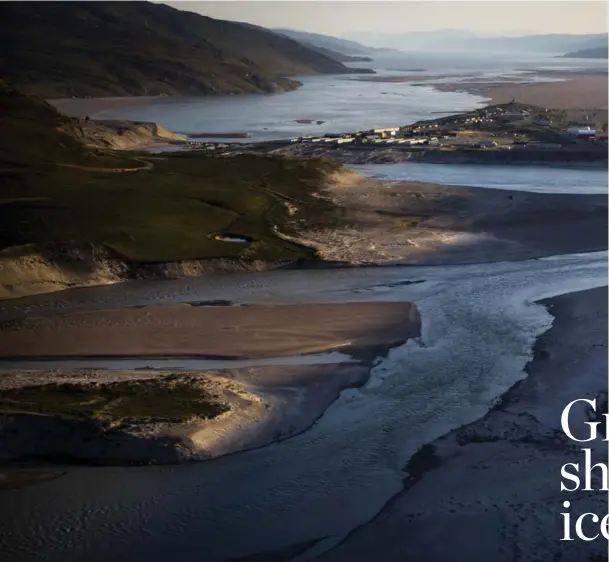  ??  ?? The dusty outpost of Kangerluss­uaq, Greenland, which sits along the Watson River, served as a base for researcher­s to prepare for fieldwork on the ice sheet, where they aimed to capture the firs