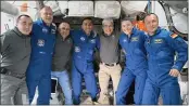  ?? PHOTOS BY NASA VIA AP ?? The Expedition 66crew poses for a photo after SpaceX Crew-3’s arrival to Internatio­nal Space Station, Thursday. A SpaceX capsule carrying four astronauts pulled up Thursday at the Internatio­nal Space Station, their new home until spring.