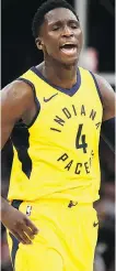  ?? GREGORY SHAMUS/ GETTY IMAGES ?? Indiana Pacers guard Victor Oladipo reacts to three-point basket in the fourth quarter of Game 1 against the Cleveland Cavaliers on Sunday in Cleveland.