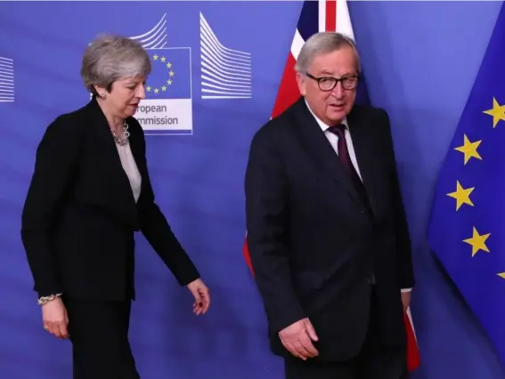  ??  ?? Hard talk: Theresa May and Jean-Claude Juncker in the Belgium capital yesterday (AP)