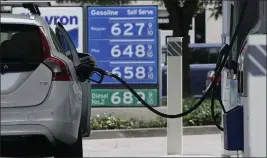  ?? RICH PEDRONCELL­I — THE ASSOCIATED PRESS FILE ?? Gas is advertised for more than $6per gallon at a gas station in Sacramento.