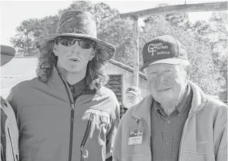  ?? Juliana Hodges ?? Colby Rasmus, with Gibbs Family Farm owner Wendell Gibbs, tried to keep a low profile at Gibbs’ annual cattle sale, but someone recognized him as “the outfielder that used to play for St. Louis.”