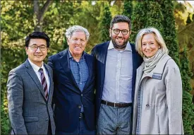  ?? OHIO STATE UNIVERSITY ?? Dr. K. Luan Phan (left), chair of the Department of Psychiatry and Behavioral Health at Ohio State University, stands with members of the Schottenst­ein family: Jay, his son Jeffrey and his wife Jeanie. The family donated $10.15 million to OSU to create the Jeffrey Schottenst­ein Program for Resilience, which will focus on helping students develop coping mechanisms to help avoid mental health problems.