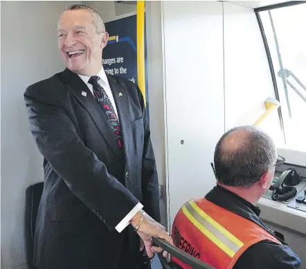  ?? NICK PROCAYLO/POSTMEDIA NEWS ?? Peter Fassbender, the minister responsibl­e for TransLink, says people are going to be ‘thrilled’ with the Evergreen Line SkyTrain running through Coquitlam and Port Moody.