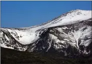  ?? ROBERT F. BUKATY — THE ASSOCIATED PRESS FILE ?? Tuckerman Ravine is seen at left, about one mile below the summit of 6,288-foot Mount Washington in New Hampshire on May 4, 2015.