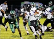  ?? BRUCE R. BENNETT / THE PALM BEACH POST ?? Park Vista’s John Smith runs against Atlantic’s defense during the Eagles’ 10-3 win on Sept. 22. The teams have a rematch this week.