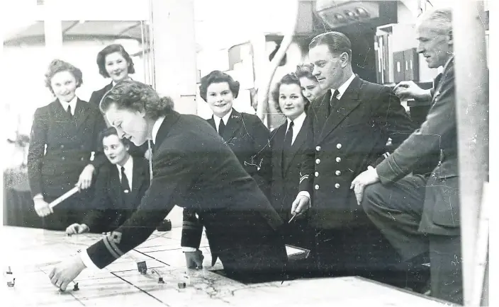  ?? ?? A few months after D-Day, The News’ wartime photograph­er Victor Stewart was allowed into the top secret maze of tunnels beneath Fort Southwick from where D-Day operations were controlled