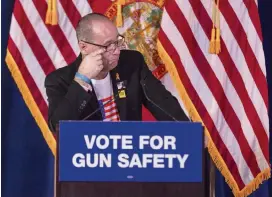  ?? MATIAS J. OCNER mocner@miamiheral­d.com ?? Fred Guttenberg, the father of Jaime Guttenberg — who was killed during the Parkland shooting last February — wipes a tear during his discussion on gun safety at the Coral Springs Museum of Art in October.