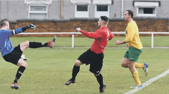  ??  ?? Action from Horden’s win over Durham Trophy holders Gateshead Leam Rangers, with Robbie Renwick scored four and John Bowes hit a brace.