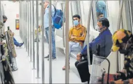  ?? RAJ K RAJ/HT PHOTO ?? A sparsely occupied Metro train at the Rajiv Chowk Metro station Friday. n