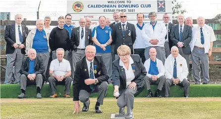  ??  ?? Caledonian Bowling Club got their season under way when ladies president Sylvia Anderson threw the first jack watched by club president Ivan Stewart.