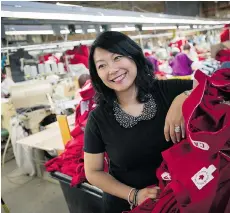  ?? KEVIN VAN PAASSEN FOR NATIONAL POST ?? Kathy Cheng, president of WS & Co. and founder of its Redwood Classics line, says she has become a “crusader for Canadian garment manufactur­ing.” The Cheng family built their empire amid mounting
pressure from offshore competitio­n.